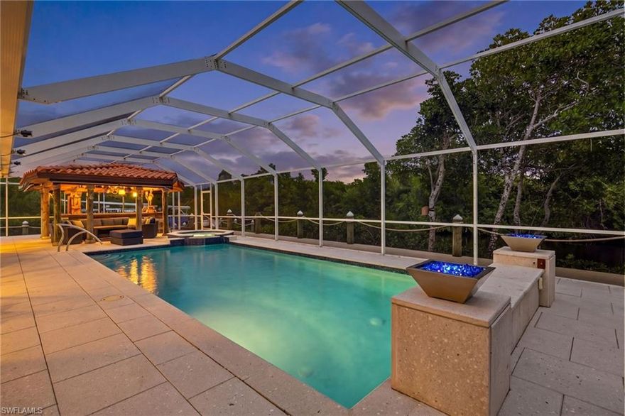 Welcome to your private TROPICAL PARADISE! This beautifully renovated single-family home offers the ultimate waterfront lifestyle with direct access to the Caloosahatchee River. The heart of the home is an expansive, sun-filled family room designed for effortless entertaining, which flows seamlessly out to a spectacular pool area.
Step outside to find your own backyard oasis, featuring a massive resort style tiki hut and bar that brings those authentic island vibes right to your doorstep. Whether you are launching your boat for a sunset cruise or hosting friends and family poolside, this home perfectly captures the essence of luxury living on the water. Don't wait too long to experience the true meaning of Florida living—this opportunity doesn't come around very often!