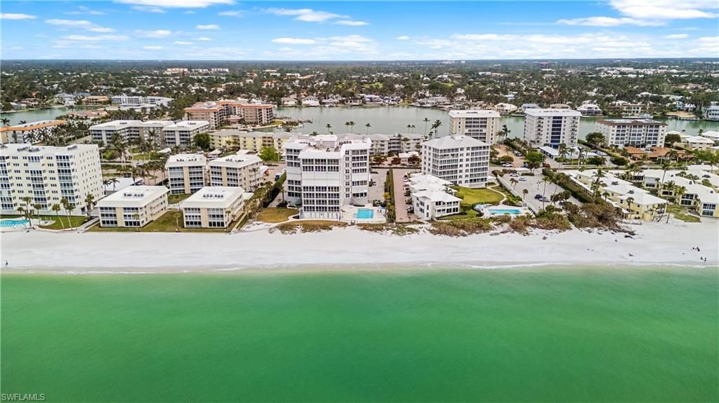 Photo of 2800 Gulf Shore BLVD N #100, NAPLES, FL 34103 (MLS # 225008408)