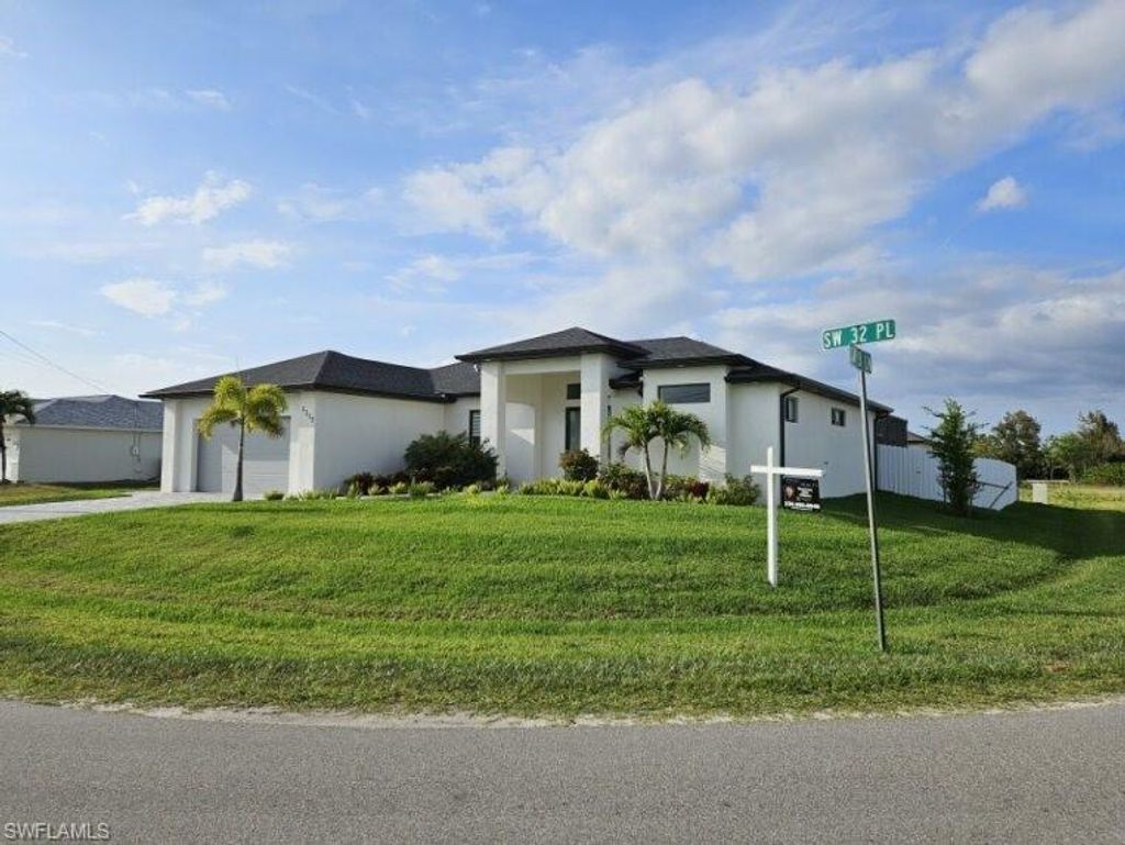 Photo of 3217 N 3rd LN, CAPE CORAL, FL 33991 (MLS # 2025017373)