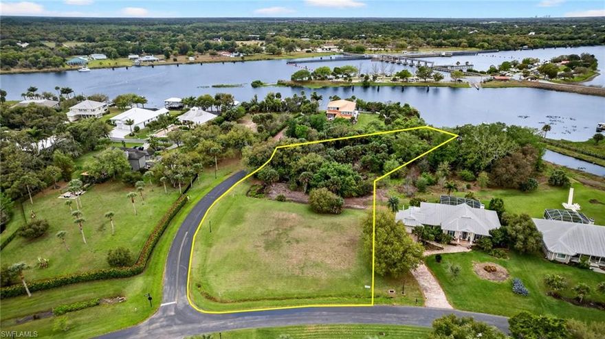 Welcome to your private oasis in Riverwind Cove, an exceptional opportunity to build your dream home along the scenic Caloosahatchee River. This expansive 1.44-acre parcel at 18151 River Chase Ct offers a rare blend of natural beauty and flexibility, serving as a true blank canvas for your custom vision.

This property is graced with mature oak trees that provide shade, character, and a serene, old Florida ambiance. Whether you envision a modern estate, a classic southern retreat, or a peaceful getaway, this lot offers ample space for a main residence, guest house, outdoor living areas, and more.

Enjoy riverfront living on the Caloosahatchee with the potential for stunning water views, sunsets, and abundant wildlife right in your backyard. While taking advantage of its quiet, tucked-away feel, this property is ideally located just 15 minutes from the vibrant and growing community of Babcock Ranch, offering shopping, dining, parks, and community events, as well as convenient access to I-75 for an easy commute to Fort Myers, Punta Gorda, and beyond.

If you're looking for privacy, space, and the freedom to create something truly special, this Riverwind Cove homesite is an unparalleled opportunity to bring your vision to life.
