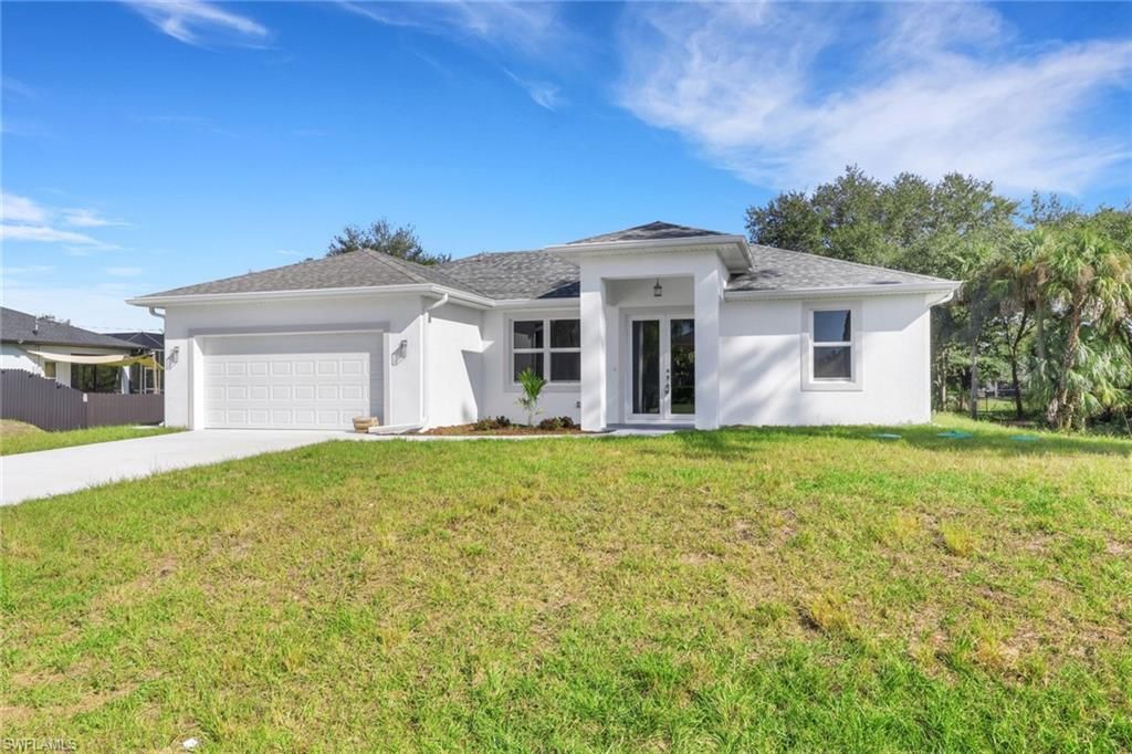 Photo of 604 Columbus AVE, LEHIGH ACRES, FL 33972 (MLS # 225083628)