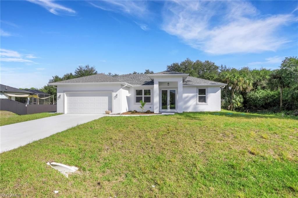 Photo of 604 Columbus AVE, LEHIGH ACRES, FL 33972 (MLS # 225083628)