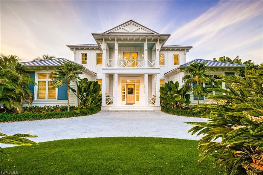 Welcome to 225 4th Avenue North, a private breathtaking retreat just 4 homes from the beach in Olde Naples. 
Designed by Kukk Architecture and completed in 2021 by The Williams Group—this one-of-a-kind home stretches across 3 lots for a true estate-like setting. The main house includes 5 bedrooms, 5.5 baths, loft with wet bar, outdoor living with an outdoor kitchen and a private back yard. The detached guest house features one guest suite, outdoor living, dining an outdoor kitchen, as well as gym with secluded outdoor deck. Only the finest appointments were used throughout this property; complete smart home technology with Savant Systems; lift & slide doors; a chef's kitchen appointed with Sub-Zero & Wolf appliances, quartz tops, Ruffino cabinetry; 3 sets of washer/dryers; 2 outdoor summer kitchens; 2 two-car climate-controlled garages off alley, a wine room, full-house generator, and much, more. Find serenity in the resort-like backyard. This unprecedented estate is ideally located just a short stroll from the world-class shopping, fine dining, entertainment, and white sand beaches of Third St. South and 5th Ave. South. Note, the third lot could be split off.