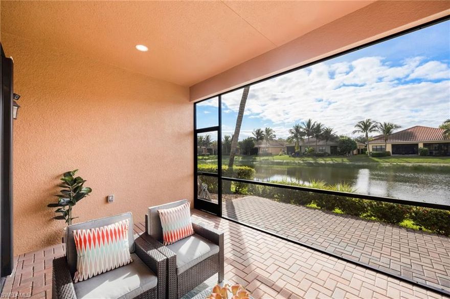 "Live Life Beautifully In Southwest Florida" at this beautifully upgraded residence in Marbella Isles. This home’s southern exposure and tranquil lake view create a light-filled setting and provide the perfect backdrop for everyday living and outdoor enjoyment. Inside, the home features modern wood-look porcelain tile flooring throughout the main living areas, complemented by contemporary ceiling fans and window treatments with shades throughout, including plantation shutters on the front window and Vertiglides on the sliding doors for privacy and light control. The kitchen—originally designed as the GL Homes model kitchen—serves as a true focal point, offering both style and function. Upgrades include lower cabinetry redesigned with drawers instead of doors, an additional wall cabinet for extra storage, and a cabinet-style pantry conversion. The kitchen is complete with a modern KitchenAid hood with integrated lighting, KitchenAid refrigerator, GE cooktop with standalone oven and microwave, an upgraded large porcelain sink, and a layout ideal for both daily living and entertaining.  Significant mechanical and system upgrades provide peace of mind, including a high-efficiency 3.5-ton air conditioning system installed in 2022, featuring UV light technology to combat mold and allergens, an air ionization cleaning unit with transferable warranty. Additional improvements include a whole-house water filtration system and reverse osmosis for the kitchen sink and refrigerator.  The primary bathroom has been upgraded with modern marble-look porcelain tile flooring and shower walls, creating a clean, spa-like retreat. Additional interior features include laundry room wall cabinetry, a laundry sink with tiled backsplash, upgraded sliding door rollers, and the home being pre-wired for an audio system.  Outdoor living is enhanced by an extended paved lanai overlooking the lake, wired for a ceiling fan and equipped with two additional overhead lighting connections, making it an ideal space to enjoy the southern exposure and peaceful water views. Storm and utility preparedness are addressed with hurricane impact windows at the front of the home, accordion shutters for side windows and sliders, an exterior power hookup for a backup generator, and a transfer switch installed in the breaker panel.
Residents of Marbella Isles enjoy an impressive array of amenities, including a resort-style pool, kiddie pool with slides, clubhouse with kitchen, community room, card and game rooms, fitness center, and a half-court basketball and volleyball court. Ideally located just 25 minutes from SW FL's International Airport, 10 minutes to local beaches and the Mercato shopping and dining district, and 15 minutes to Olde Naples “Downtown,” this home offers exceptional value, natural light, and lifestyle in one of Naples’ most desirable communities.