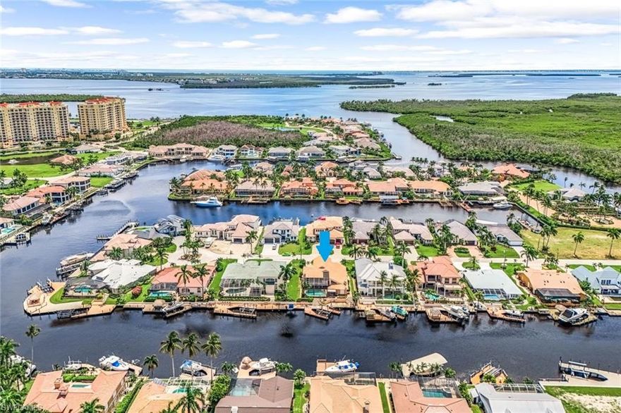 PRIME LOCATION in a boater’s paradise! Considerably THE most desirable street in Cape Coral, welcome to your exquisite waterfront home nestled among million dollar estates with direct sailboat access to Fort Myers beach and the Islands. You’ll enjoy the convenience of jumping on your boat and cruising to the many waterfront dining and nightlife attractions nearby. Or if you’d prefer a quick stroll, across the street is Cape Harbour, featuring restaurants, shopping, and live entertainment. This two-story home sits along the 150 ft wide Beethoven Canal and comes with a sizeable composite boat dock (20k lb boat lift), plus an oversized pool for cooling off in the summer months. The interior of the home is ready for renovation to reflect your personal taste, lifestyle, and needs. Looking to build new? No problem, this is the ideal location to start from scratch and build your custom home. Don’t miss out on your chance to live the Florida dream--schedule your private tour today!