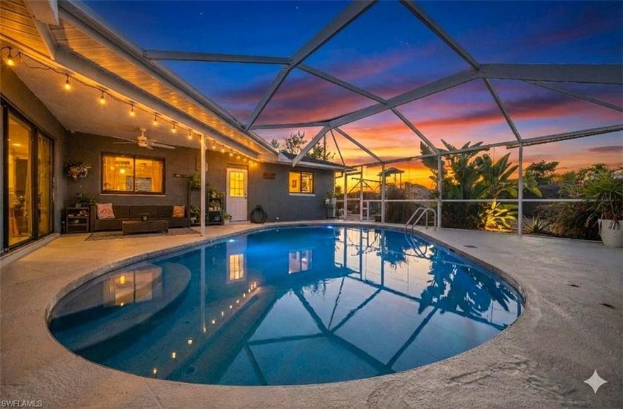 Welcome to 614 NE 1st Ave, a thoughtfully updated single-story pool home offering a rare blend of character, functionality, and outdoor living in an established Cape Coral neighborhood located less than 4 minutes from shopping and family entertainment. This 4-bedroom, 2-bath residence features an open, flexible layout anchored by a striking brick fireplace and inviting kitchen that immediately stands out.  Plus, no HOA, a bonus room, and located in FLOOD ZONE X likely making flood insurance optional.

The kitchen showcases custom cabinetry, butcher-block countertops, a large center island, stainless steel appliances, open shelving, and real-brick accent walls that flow seamlessly into the dining and living areas. The open-concept design provides excellent connectivity while still offering defined spaces for daily living.

Tile and wood-look vinyl plank flooring continue throughout the home, complemented by updated lighting, ceiling fans, and neutral finishes. The primary bedroom offers direct access to the screened pool area, while additional bedrooms provide flexible options for guests, workspace, or extended use. Bathrooms have been updated with modern vanities, fixtures, and tile surrounds.

Outdoor living is a major highlight. The screened pool enclosure opens to a fully fenced backyard featuring a custom wood deck, fire pit area, mature tropical landscaping with fruit trees, and multiple seating zones.  Being a corner lot can provide flexible options for boat or trailer storage from the side road and 4 Night Owl cameras on the homes exterior at each corner provide added security and peace of mind. NEW pool pump and timer installed in 2025. 

Additional features include a two-car garage with HVAC ready for use as an office, home gym, or game-room. A tankless water heater provides continuous hot water for long showers and the house has strong curb appeal enhanced by updated exterior soffit lighting and architectural details.  Aerial views show proximity to nearby freshwater canals, reinforcing the classic Cape Coral setting buyers look for.  

Whether you’re seeking a full-time residence, seasonal home, or an STR investment property with strong visual appeal, this home offers a unique combination of indoor character and outdoor functionality — a layout and setting that resonates with both local buyers and those relocating to Southwest Florida.