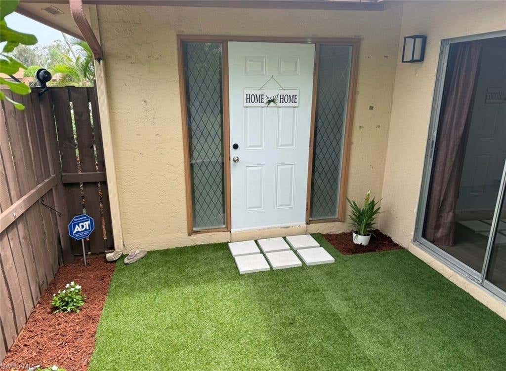 Photo of 6320 Royal Woods DR, FORT MYERS, FL 33908 (MLS # 226027291)