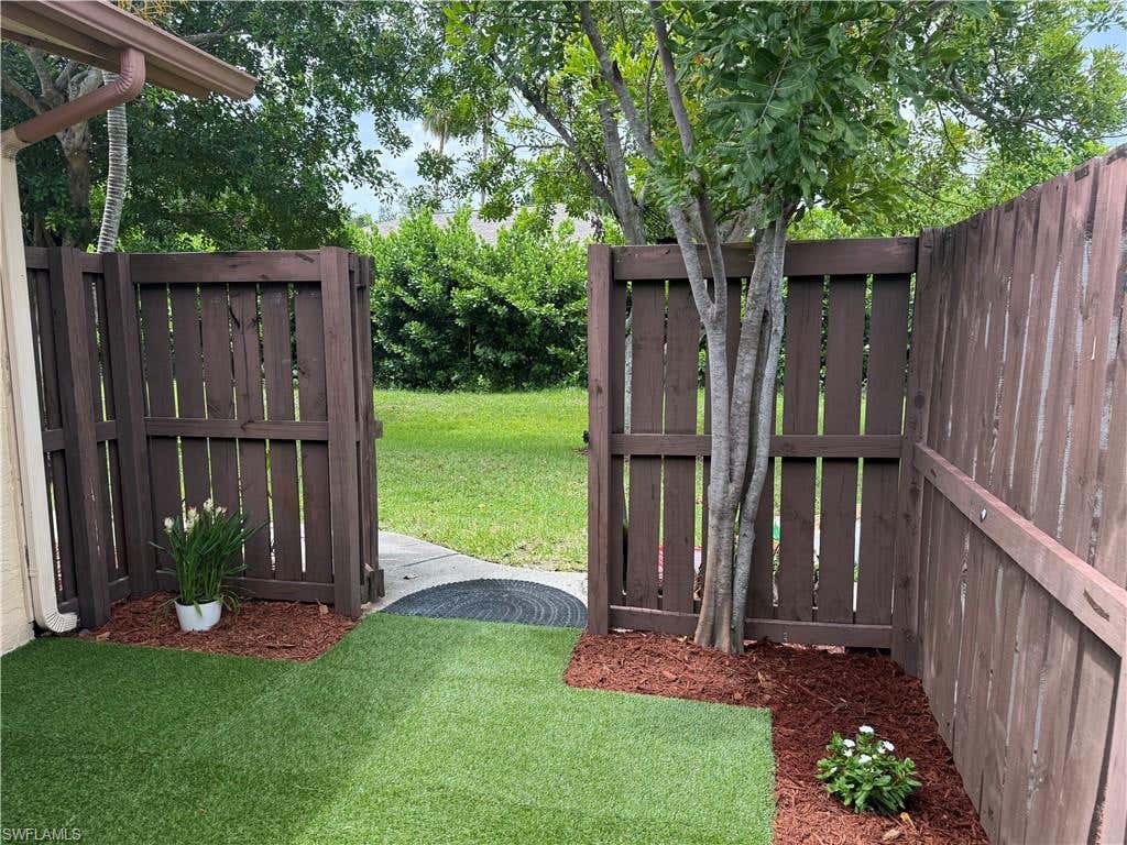 Photo of 6320 Royal Woods DR, FORT MYERS, FL 33908 (MLS # 226027291)