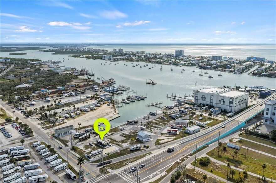 Location, location, location! Fort Myers Beach is just a walk over the bridge. RV to convey with a total asking price of $175,000. This lot is located in Gulf Cove, a co-op community. This means you own 1/60th of the community. It is a 55+ waterfront community, the Board of Directors is working on a process for the boat slip assignments. Low HOA fees, only $800/quarter! Sewer, water, and electric for the community has been completed, and an electric power pedestal has just been installed for the lot. Highway ready RVs currently allowed on the lot. Large lot with a fresh concrete pad allows enough space to accommodate a double wide trailer. New homes must be built to FEMA standards 8-10 feet above ground. Water, sewer, and electric available. Discover your new piece of paradise today!