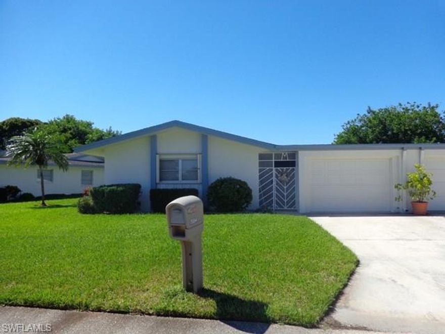 Lovely spacious 2 bedroom 2 bath with large inside laundry/utility room with access from 1 car garage and kitchen.  Large eat in kitchen with beautiful new cabinets and pantry.  Formal dining area and large living room opens to spacious lanai stretching across the back. Easy close accordian shutters across lanai. Beautiful view of landscaped area and community pool.  Loads of closets for  storage and master has a big walk in closet.  Flat roof replaced in 2010.  AC in 2011.  Whiskey Creek Village Green II is a 55+ community with monthly fees of $260. Furniture is included or can be removed.  Join Whiskey Creek Country Club for golf or social membership and join in all the fun for a very reasonable rate.  Conveniently located with access off McGregor Blvd. and off College Pkwy.