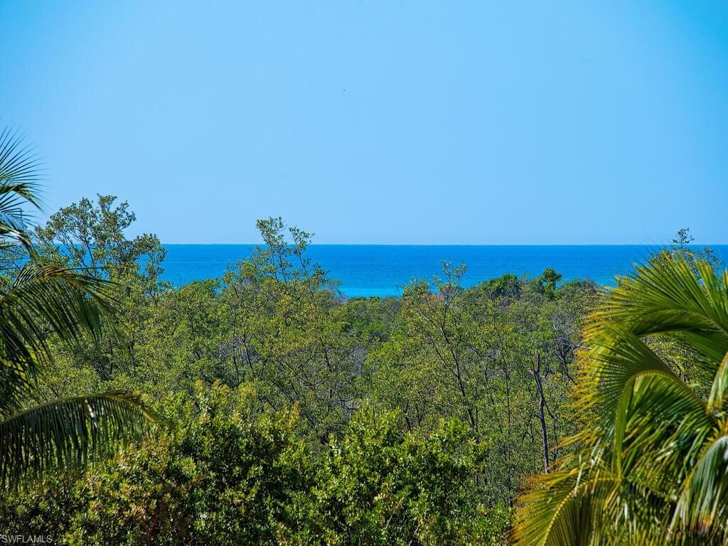 Photo of 6597 NICHOLAS BLVD #503, NAPLES, FL 34108 (MLS # 225081358)