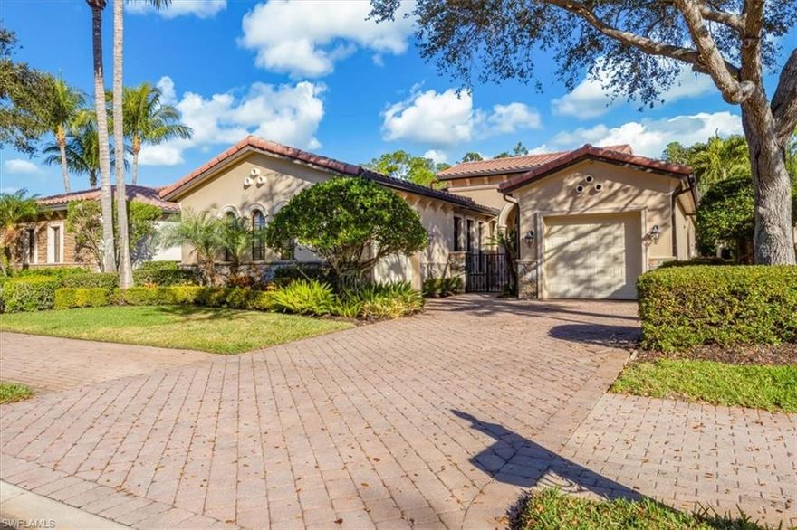 This exceptional value-added price per square foot single-family villa in Mediterra, offers remarkable character, charm, and lifestyle opportunity. Built by Taylor Morrison, the residence features classic stucco exterior finishes with stacked stone accents, a gated front courtyard with double-door entry, split garages, and lush, mature landscaping. Inside, soaring ceilings and neutral tile set on the diagonal enhance the main living areas, complemented by extensive millwork, window casements and banding, intricate ceiling details, and abundant designer lighting including chandeliers, sconces, and recessed fixtures. The gourmet kitchen is appointed with granite countertops, stone backsplash, GE appliances, natural gas cooktop, and a separate butler’s pantry with wet bar, cabinetry, and wine cooler. Dining options are plentiful with a large breakfast bar, informal nook, formal dining area, and outdoor dining. Expansive sliding doors open to a brick-paver covered lanai with upgraded summer kitchen featuring a natural gas built-in grill, outdoor beverage refrigerator, sink, granite counters, and storage, all overlooking the screened pool area with added awnings for shade. The private rear yard offers additional fenced space ideal for pets, gardening, or play, along with excellent privacy. The owner’s suite serves as a peaceful retreat with lanai access, dual walk-in closets, and a spacious en-suite bath with oversized vanities, makeup area, soaking tub, walk-in shower, private water closet, and neutral finishes. Two additional guest suites offer en-suite baths, generous closets, recessed lighting, and ceiling fans, while a separate den or office features hardwood floors, crown molding, and a flexible layout. Located within the prestigious Mediterra Golf & Country Club, residents enjoy resort-style living.  Depending on your membership with Mediterra the opportunities are plentiful. 2 eighteen hole Tom Fazio–designed championship golf courses, driving range, training golf facility, tennis, pickleball, bocce, fitness and wellness center, scenic sidewalks, refined dining, and the newly renovated private gated Mediterra Beach Club on the beach features dining, bar service, pool, sundeck, and full cabana beach service, Mediterra is all conveniently close to Naples' dining, shopping, beaches, and RSW International Airport.