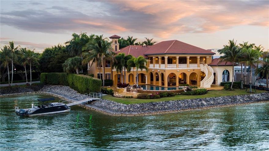 Statement Waterfront Living. Sweeping open lake views provide the backdrop for an extraordinary resort lifestyle in the magical setting of Castelli at Miromar. A gated sanctuary featuring architecturally striking interiors surrounded with transcendent outdoor living space. Classic meets contemporary at Via Lombardi. An essence of timelessness is paired with every imaginable modern convenience.
A thoughtfully designed open floor plan inspired by the SWFL lifestyle.  Live and entertain wrapped in picturesque views from every major room.  Welcome guests to a private suite w/patio. Gourmet kitchen w/wine cellar, home theater, formal living/w fireplace, dining room and family room on the main floor flow seamlessly to the beautiful exterior.
Ascend the stately staircase to the upper level to find a fully equipped fitness center, office, and 4 additional bedroom suites. Deluxe master features Alhambra style bath, balcony w/ fireplace.
Dine alfresco by the pool or escape by boat from your private dock and take in the beauty of 700 miles of freshwater lakes.  
A majestic grand estate dream home sheltered within the gates of the award-winning amenity rich community of Miromar Lakes.