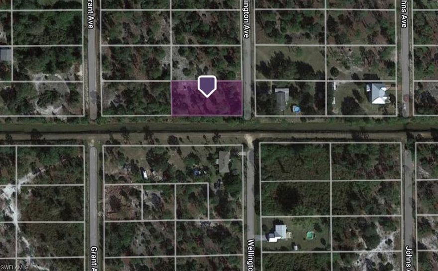 SPACIOUS HALF-ACRE PLOT ON A CANAL - Dead End Road! : Discover your ideal future home nestled on this expansive and perfectly elevated lot, primed for construction in Lehigh Acres, FL. Enjoy the convenience of a generously sized plot, offering ample space for your dream residence. With its "high and dry" terrain, this property promises a solid foundation for your vision to take shape. One of the only Half- Acre Canal lots on a dead end.