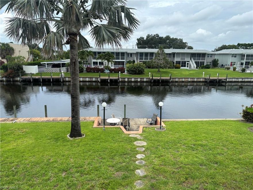 Enjoy the best of Florida living in this charming 1 bedroom, 1 bath condo on a canal with gulf access. Ideal for boaters and water lovers alike, this community offers a true tropical retreat. Relax by the large sparkling pool, stroll through the beautifully landscaped grounds adorned with vibrant flowers, or take your boat and head to the Gulf. Whether you're looking for a seasonal getaway, year-round residence, or investment opportunity, this condo delivers classic Florida charm in an unbeatable waterfront setting. Located steps from the bustling Cape Coral's entertainment district. HOA fees include city water. Current taxes are non-homestead. Similar condos in the same complex that claim homestead pay $1,400 in taxes annually.