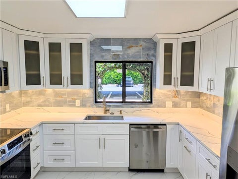 Photo of 910 Vanderbilt Beach RD #414, NAPLES, FL 34108 (MLS # 226038860)