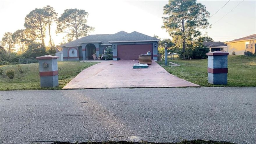 Come see this beautiful rare home in the most sought after area in Lehigh Acres Fl. This 4 bedroom 2 bath home has beautiful glass tile through out the common areas in home. This home has brand new hurricane impact resistant windows and sliding glass doors installed 11/21. This home has a brand new roof that was completed in 11/21. Vaulted ceilings with beautiful crown molding throughout the entire home. The garage has been converted into a family room with central air. Stainless steel appliances with a eat in kitchen and formal dining area. Master room has his and hers custom closets. This is a must see home with to many features to list.