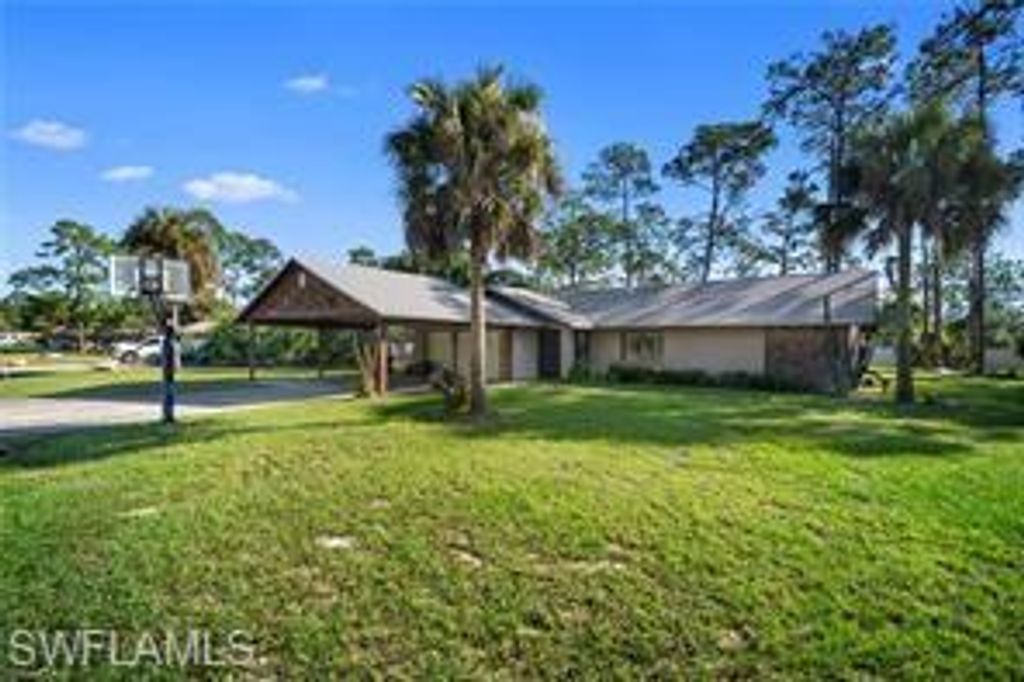 Photo of 308 Roosevelt AVE, LEHIGH ACRES, FL 33936 (MLS # 226020524)