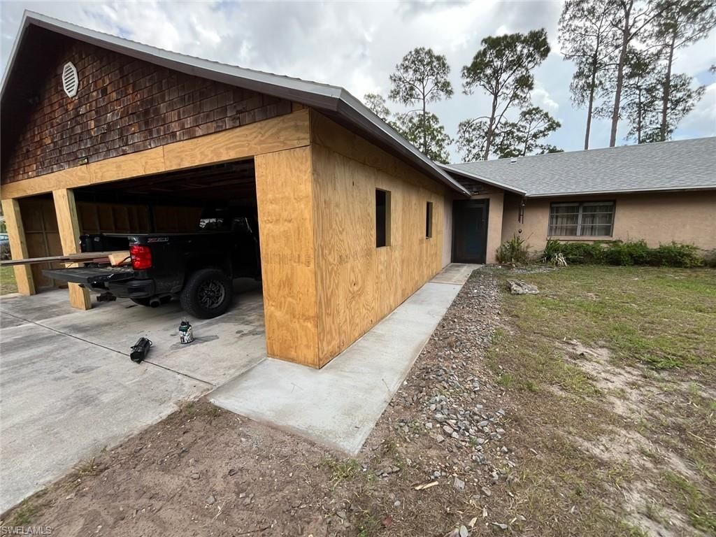 Photo of 308 Roosevelt AVE, LEHIGH ACRES, FL 33936 (MLS # 226020524)
