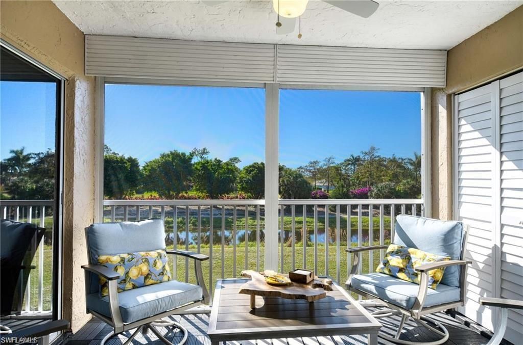 Photo of 5651 Rattlesnake Hamm RD #C-201, NAPLES, FL 34113 (MLS # 226015042)