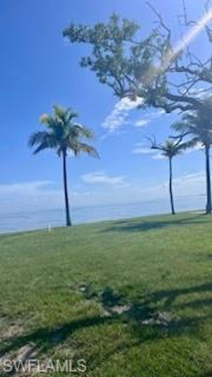 One bedroom one bath completely renovated manufactured home in one of Pine Islands best kept secrets- Cap N Mac's! This Manufactured Home Co-Op Community's premier location at the Northern tip of Bokeelia has both Back Bay and Charlotte Harbor views. Resident Owned Community, No Rentals, and 55 + age restriction.  Co-op Owns 4 Acres Including A Private Gated 407 Foot Fishing Pier with a pavilion on Charlotte Harbor as well as a grassy area and private beach area.  28 total lots in complex. Additionally, Pavilion and Community boat ramp on Back Bay with boat slips available for rent ($30/mo) on a first come first serve basis. Perfect for a winter seasonal retreat or full time residence! HOA only $150/mo! Schedule your tour today!