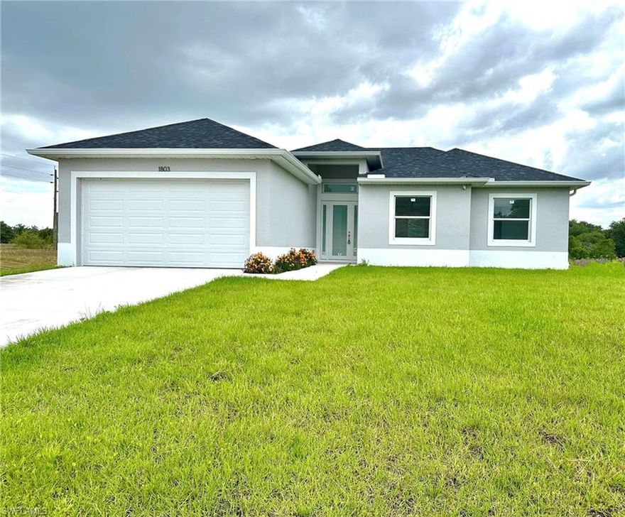 GREAT OPPORTUNITY! New construction 2023. Don't miss the opportunity to buy the home of your dreams in the city of Lehigh Acres, in a privileged location close to Schools, Shopping Centers ,Palm Beach Blvd and just minutes from road 80 and I75. This beautiful home has a Modern architectural design and high ceilings. A spacious living room surrounded by high impact windows and doors, wood kitchen cabinets with quartz countertops and stainless steel appliances, ready to be installed at closing. It has a covered terrace and plenty of space for your future pool, leaving even more space for any other purpose. Don't wait any longer and make your appointment to see it in person.