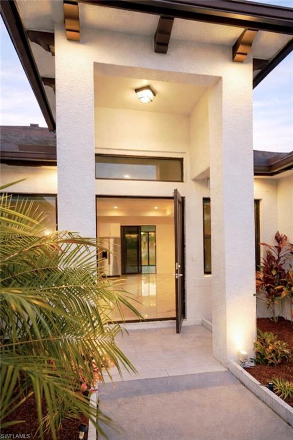 Photo of 593 39th AVE NW, NAPLES, FL 34120 (MLS # 226009921)