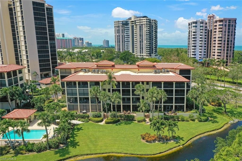 Photo of 6080 Pelican Bay BLVD #A-202, NAPLES, FL 34108 (MLS # 223033980)