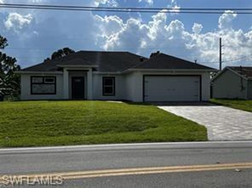 Decent size home and a HOT location in lehigh acres to become your home.  This home features shaker cabinets, granite counters, and tile throughout.  Close to Schools and shopping.