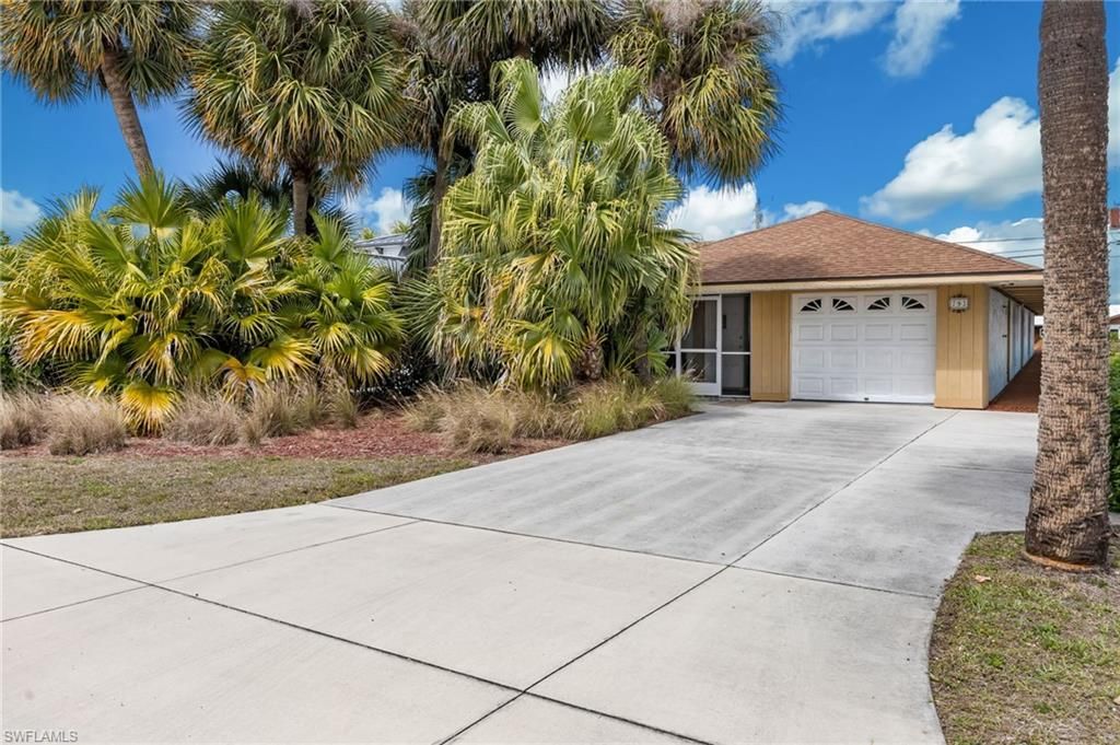 Photo of 793 91st AVE N, NAPLES, FL 34108 (MLS # 226009756)