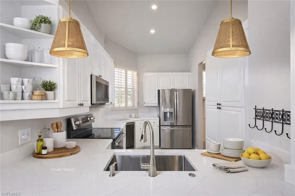 Photo of 1033 Egrets Walk CIR #203, NAPLES, FL 34108 (MLS # 226004275)