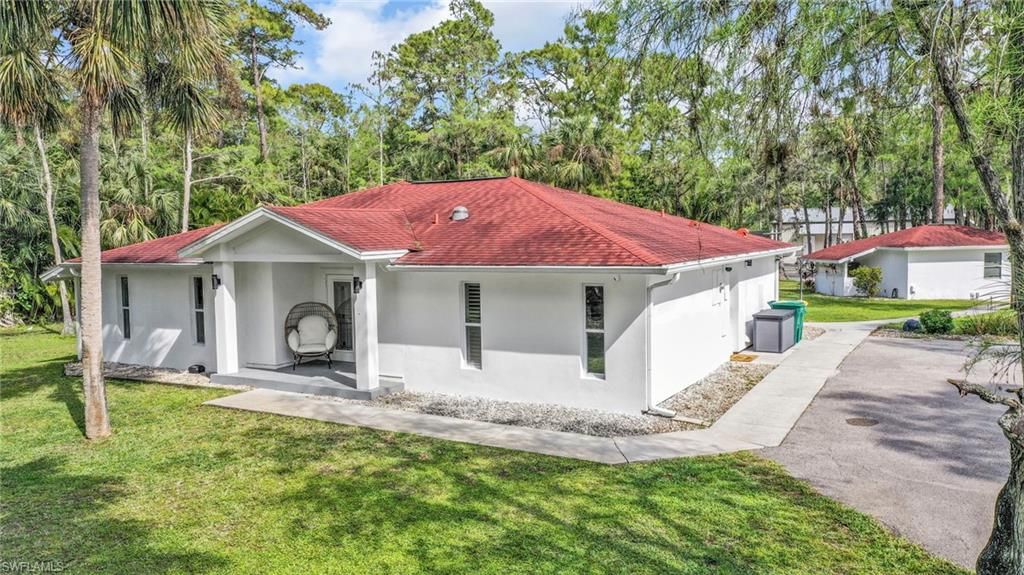 Photo of 3231 13th AVE SW, NAPLES, FL 34117 (MLS # 226012015)