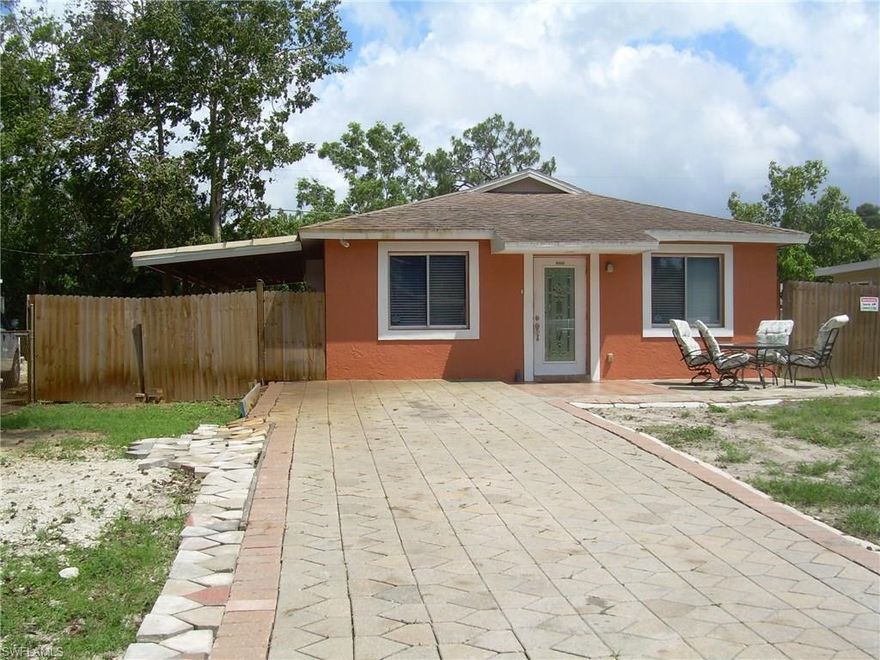 Move in ready!! Home features 3 bedrooms, 2 bathrooms, family room, open kitchen and laundry room.  Water heater one year old, newer kitchen cabinets (3 years old) and brand new counter tops and  backslash, , new vanities and shower tile on both bathrooms and new lanai done with permits.  Air conditioning and handler only 4 years old. Large paved driveway.  Washer and dryer do not convey.  Home is completely fenced in for privacy.  A must see!!  Call me for your private showing.  Large space for parking cars or trucks.  NO HOA fees.