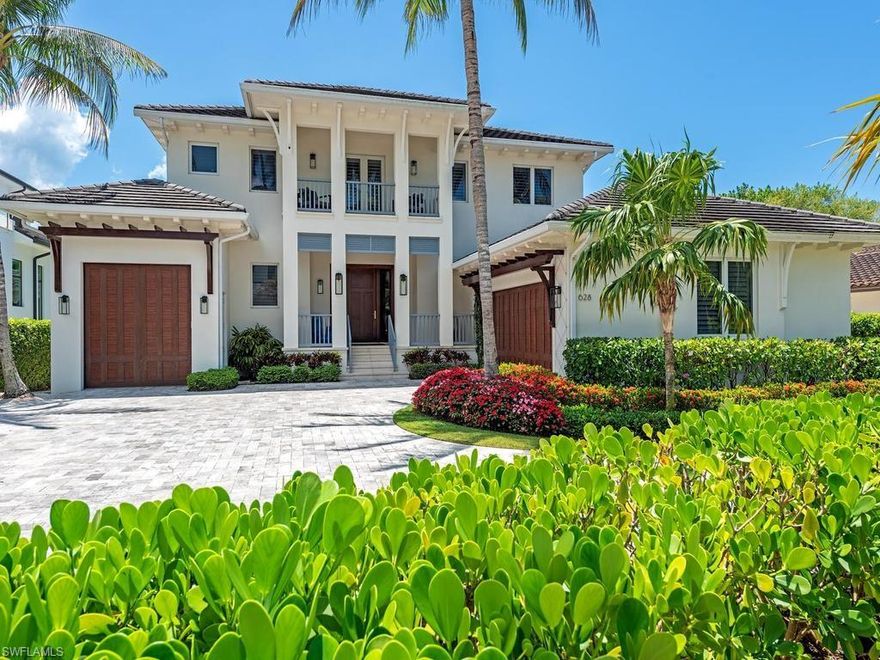 Welcome to an exceptional waterfront residence in Aqualane Shores—where refined coastal elegance meets effortless Gulf access.

Designed by the renowned architectural firm MHK, this stunning home beautifully blends coastal sophistication with West Indies influences, creating a timeless yet relaxed aesthetic throughout.

Boasting five spacious bedrooms, four full bathrooms, two half baths, and office; the home offers an ideal layout for both everyday living and entertaining. Inside, you'll find exquisite white pine and French oak flooring complemented by elegant marble accents, along with custom cabinetry that adds both style and functionality.

The chef’s kitchen is truly a showpiece—featuring premium gas Miele appliances, a double oven, and a wine room—perfect for hosting and culinary enthusiasts.

Seamlessly transition to outdoor living where a heated pool and spa, fully equipped outdoor kitchen, expansive patio, and serene sunroom provide the perfect setting to relax and entertain while enjoying tranquil water views.

Boating enthusiasts will appreciate the state-of-the-art dock, complete with a 20,000-pound boat lift, offering direct canal access to the Gulf of Mexico for the ultimate Southwest Florida lifestyle.

This is waterfront luxury living at its finest—where design, comfort, and location come together in perfect harmony.