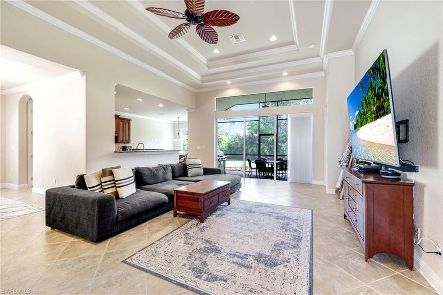 WOW! 2600 plus square feet, THREE bedroom PLUS DEN home, priced to sell! You will fall in love with this like new, spacious and beautiful, open concept home. The grand foyer is only the beginning! Continue exploring and you will find the great room, kitchen and dining area -- all with lanai access.  These rooms also face the private preserve area, allowing for lush, tropical views. Here, you will gather with family and friends to sip your morning coffee at the breakfast bar or enjoy your evening cocktails on the lanai as you relish a feeling of serenity. There is plenty of space to build your dream pool or to extend your lanai!  Life in Florida never felt this good! The owner's suite is large and comfortable, with a private bath and huge closet. With three bedrooms, and three bathrooms, hosting friends and family will be a breeze. The floor plan allows for so much privacy with the guest rooms on the opposite side of the home from the primary ensuite. Located in the very desirable community of Belle Lago, this well cared for home will surely not last. Belle Lago is located in one of the most convenient areas in all of Southwest Florida, only minutes from the famous Barefoot Beach, world class dining, shopping and especially close to the SWFL International Airport! This community boasts a clubhouse, a resort style pool, an amenity center with bocce, tennis, pickleball, basketball and so much more And the LOW HOA fees! Schedule your exclusive showing today before the secret is out! AGENTS, please read confidential notes regarding showing request!