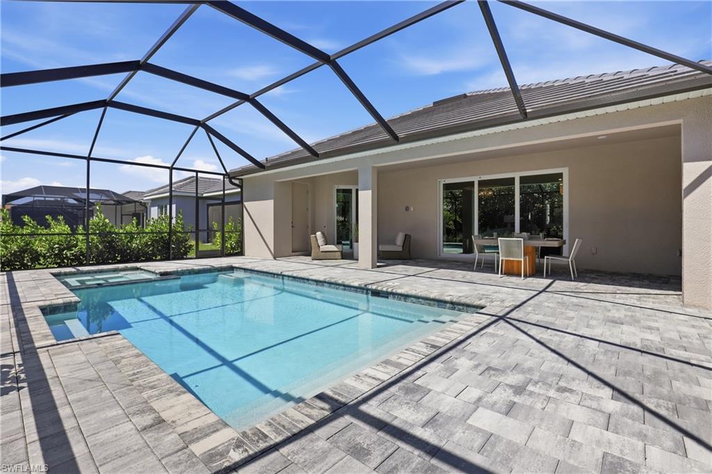 Photo of 15725 Raveneli CT, FORT MYERS, FL 33908 (MLS # 226027974)