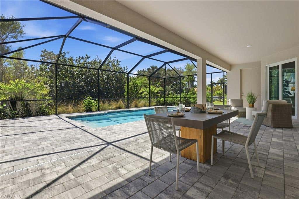 Photo of 15725 Raveneli CT, FORT MYERS, FL 33908 (MLS # 226027974)