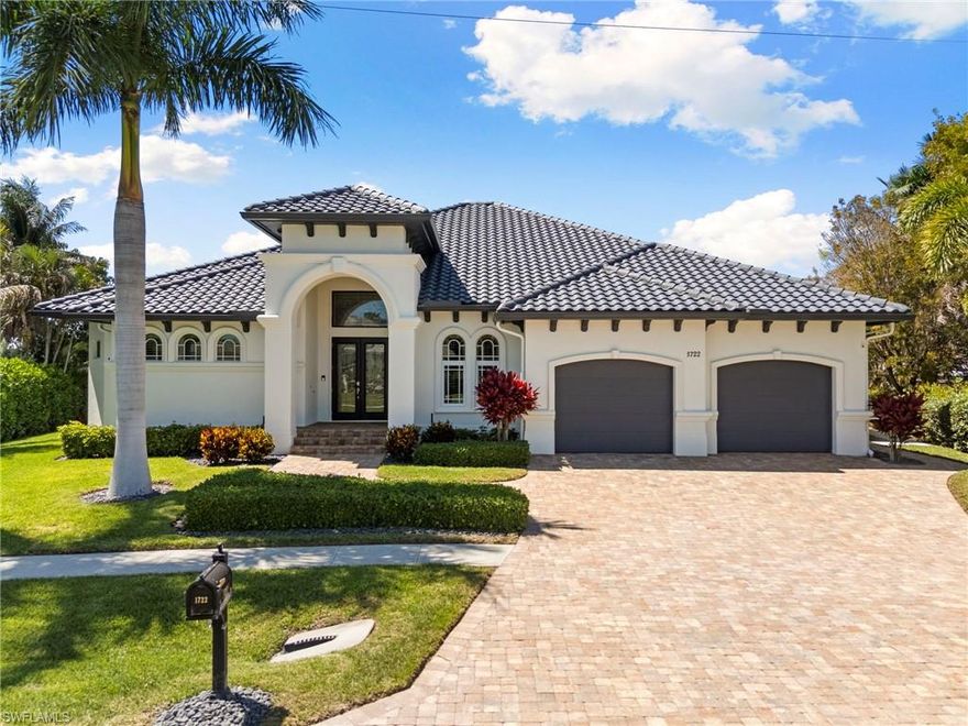 Experience the ultimate Marco Island lifestyle in this rare, single-level waterfront masterpiece featuring wide water views and coveted Western Exposure for breathtaking nightly sunsets. Situated on an oversized .3-acre lot with 153 feet of prime water frontage, this 3,169 sq. ft. estate offers seamless coastal living and quick access to the Gulf.  The home’s newly updated exterior opens to a sprawling interior designed for entertaining. The chef’s kitchen is a showstopper, featuring granite countertops, a massive island, and a clever hidden butler’s pantry.  Retreat to one of three generous bedrooms, all featuring private ensuite baths.  Enjoy the convenience of TWO laundry rooms, one for the household and a private one in the master closet.  The versatile 12x13 den can serve many purposes: perhaps a 4th bedroom, an office, or a media room.  The home opens to your own private 2,200+ sq. ft. screened sanctuary, where the vast canal views take center stage. This massive lanai features an oversized pool with a brand-new 2025 pool deck, an inground spa, and a professional outdoor kitchen with granite finishes—the perfect front-row seat for sunset cocktails.  Boaters will find no equal: the massive 2,050 sq. ft. dock (built 2023) includes a 36’ slip (24k lb lift), a 29’ slip (10k lb lift), and a dedicated 16x20 platform for 4 jet skis (13k lb lift). Complete with a canopied fish cleaning station, a large sundeck, and 2009 seawall this dock is a sportsman's dream.  Experience the pinnacle of Marco Island luxury in this expansive dream waterfront estate.