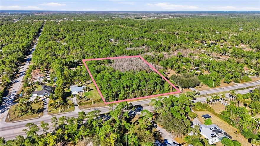 This homesite is located along the north side of Golden Gate Boulevard W., a little over one mile east of Collier Boulevard. The property offers roughly 330 feet of frontage with an average depth of 680 feet, totaling over 5 acres, providing excellent visibility, access, and flexibility for future use. Two existing access points and right-in/right-out entry from Golden Gate Boulevard W. enhance convenience and usability.

The parcel remains in its natural state with a mix of native and exotic vegetation. An informal wetlands determination has been completed for the property. Currently serviced by well and septic, the site is surrounded by single-family residences and has no HOA restrictions, offering a peaceful, residential setting with added freedom and flexibility.

Ideally positioned for both privacy and convenience, the property is within approximately 10 minutes of everyday essentials including grocery stores, gas stations, pharmacies, and restaurants, and just about 20 minutes from the white-sand shores of Vanderbilt Beach. With its generous dimensions and prime location, this parcel presents an outstanding opportunity to create a private estate on significant acreage or explore the potential to subdivide for two homes, subject to applicable regulations and approvals.