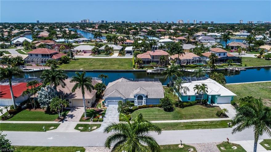 Welcome to 248 Seminole Court. Marco Island living at its best awaits you in this wonderful 3 bedroom home. When you arrive, you will pull in to the beautiful stone driveway. A great room greets you upon entry, opening up to an expansive lanai with highly sought after southwestern exposure. Enjoy the use of the outdoor Summer Kitchen while entertaining friends and family right on a water indirect canal that Marco Island is famous for. All this while being located on a quiet and private cul-de-sac street with easy access to downtown shops in both Naples and Marco Island. This well thought out home includes storm protection all around with electric storm shutters. This home is being sold As-Is.