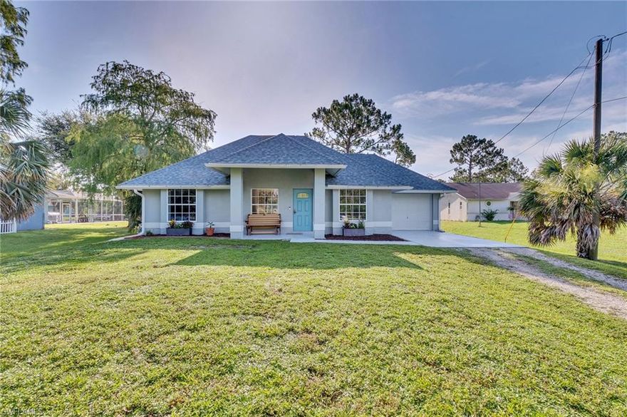 This three-bedroom, two-bathroom home in Golden Gate Estates sits on 1.17 acres. An open concept floor plan with vaulted ceilings allows for lots of natural light. The roof and flooring have been replaced and the inside and outside have been freshly painted. Manual shutters have been added for hurricane protection. This beautiful home is a must see!