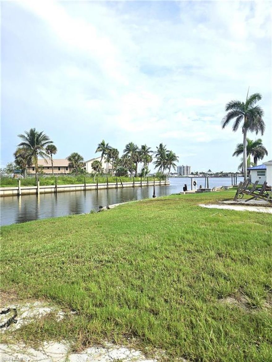 Build your dream home on this spacious waterfront lot on San Carlos Island in Fort Myers Beach. On a canal with bay views. Gulf access. Minutes from sandy beaches, restaurants, shops, and everything Fort Myers Beach has to offer.  No HOA, no age restrictions. Utilities ready for building.