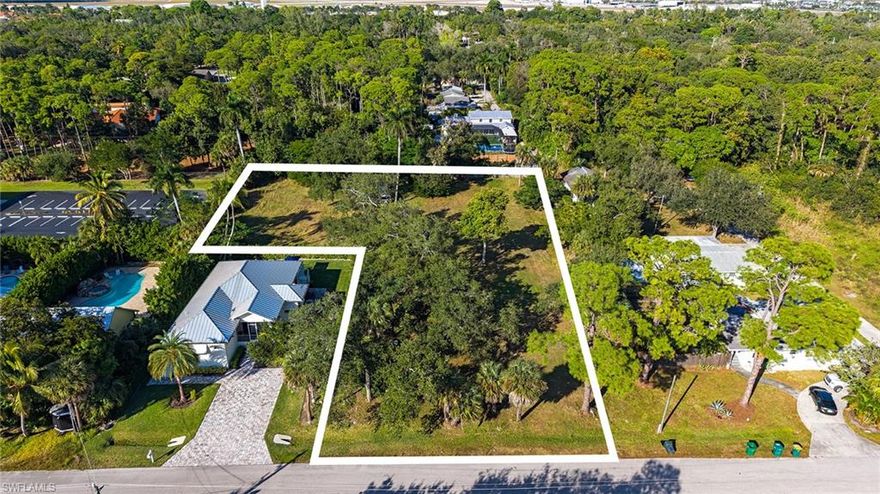 An exceptional vacant land opportunity just minutes from downtown Naples. This recently subdivided 1.06-acre partially wooded lot is zoned RMF-6, allowing for up to six units per acre, offering the flexibility to create a single custom estate of your dreams or pursue a multi-home development. The property’s size, zoning, and location make it ideal those seeking a one-of-a-kind personal residence or investors. Located less than two miles from Old Naples, the lot is conveniently close to the high-end shopping and dining of 5th Avenue South and 3rd Street South, the white sandy beaches of the Gulf, and is highly bikeable to downtown. Enjoy the peaceful setting of mature trees while remaining near everyday conveniences, including the upcoming renovation of Oakes Farms Market. A truly special canvas for your vision.