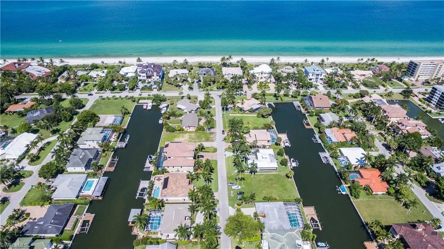 L.1507 - LOCATION, LOCATION, LOCATION! BOATERS DREAM & BEACH LOVERS PARADISE! VANDERBILT BEACH ACCESS JUST AROUND THE CORNER...I MEAN 100 YARDS FROM YOUR FRONT DOOR! SOUTHERN EXPOSURE; ONE OF THE MOST DESIRABLE LOTS ON THE MOST DESIRABLE STREET IN THE CONNOR'S AREA. BOATING, BEACH, DINING & STEPS TO LAPLAYA HOTEL. NEWER CONCRETE SEAWALL, SURVEY, ENGINEERING REPORTS, AND MORE. START BUILDING YOUR DREAM HOME TODAY!