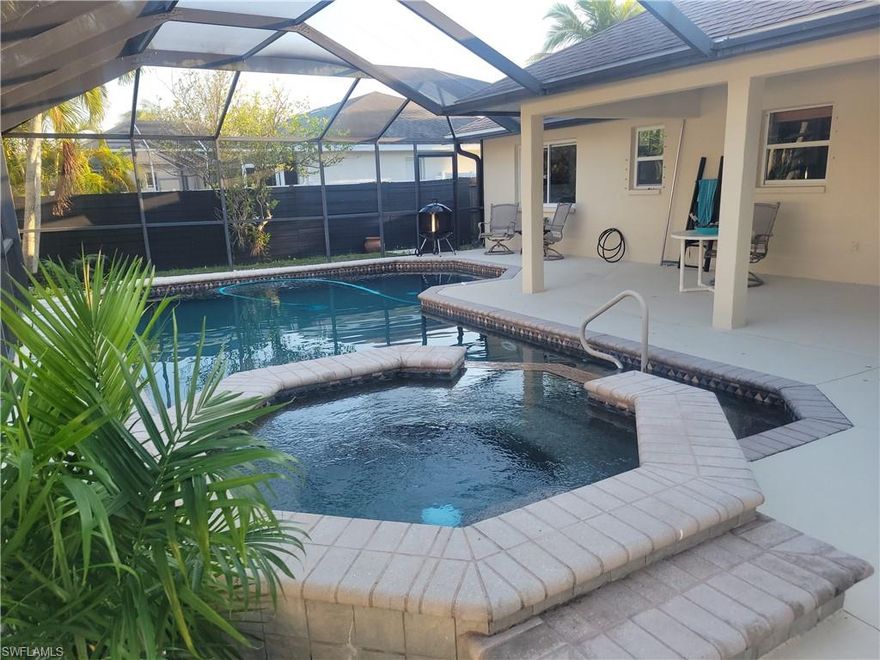 Beautiful 3/2/2 pool home in the desirable surfside neighborhood. Extremely large lanai  with L shape pool. Bathroom remodeling currently in progress. Fenced yard for privacy. Upgraded kitchen appliances , washer and dryer as well.  Small finishing touches are currently be done to the home.  Must see before it's gone. Once again it's in South West Cape most desirable neighborhood.