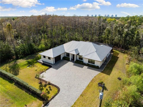 Photo of 25526 Busy Bee DR, BONITA SPRINGS, FL 34135 (MLS # 226025199)