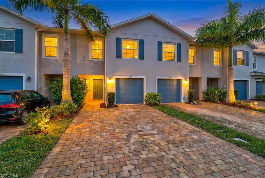 Located in desirable North Naples, this beautiful Meadowood townhome offers three bedrooms and two-and-a-half bathrooms. Upon entering, you’re welcomed by an inviting foyer that opens into a spacious great room. The kitchen, dining, and living areas flow seamlessly, creating the perfect space for everyday living and entertaining.
The kitchen is thoughtfully designed with quartz countertops and stainless-steel appliances. Sliding glass doors from the living room lead to a screened-in, covered lanai ideal for relaxing and enjoying the Florida lifestyle.
Upstairs, you’ll find three generously sized bedrooms and two full bathrooms. This Bayside townhome also features a one-car garage and a paved driveway wide enough to accommodate two vehicles, allowing for easy and convenient access at all times.