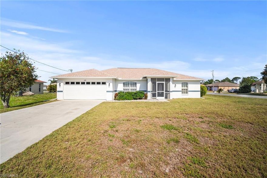 REDUCED AND READY! Welcome to this charming 3-bedroom, 2-bath home situated on a spacious corner lot with a 2-car garage. The open floor plan provides an ideal setting for entertaining guests or enjoying quality time with family. Featuring a split floor design, the home offers added privacy with the two additional bedrooms and den located on the opposite side, along with a full-size bath. The kitchen is equipped with a pantry area and ample cabinet space, making meal preparation a breeze. Step outside to the enclosed lanai, where double slider doors welcome in the afternoon breeze, creating a perfect spot for relaxation. Additionally, there is convenient access to the bathroom from the lanai. Conveniently positioned on a corner lot, this home offers both comfort and functionality for everyday living.