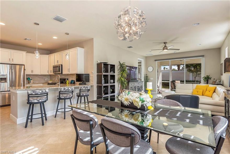 H.13809 -  Wow, recently lowered price.  And, $19k in upgrades after builder closing. A sensational VILLA with shutters. Torch Key is a quiet street and you must see this lot before you buy new.  Built in year 2017, stunning 2 bedroom + den, one-story villa that shows like a model home.  Electric storm shutters throughout, powered shade shutter on interior great room slider, gorgeous kitchen, white cabinetry throughout home, impressive back splash, granite in kitchen and bathrooms, storage cabinetry in laundry room, tile on diagonal, mounted TVs included.  What a location so close to the resort amenities and clubhouse inside the main gate of Tidewater. Torch Key Way is one of nicest locations for a villa.  Plantation shutters, custom storage racks installed in garage, added fan and light fixtures. Over $20,000 spent on upgrades after closing with the builder.  55+active lifestyle community.  See amazing amenities shown in the photo section of this listing. See photo of den as it is easily a 3rd bedroom by finishing alcove that would be a closet. Just an idea for buyer to do after closing to make a 3rd bedroom officially.    A g e n  ts See Remarks