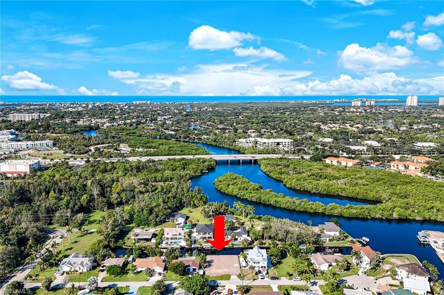THIS is the PEFECT LOCATION to build your GULF ACCESS DREAM HOME! Located MINUTES from Downtown Bonita Springs AND the Gulf BOTH by boat, you DO NOT want to miss this opportunity.  This lot is just a short walk, bike ride, kayak ride, or boat ride to Downtown Bonita, restaurants, grocery and more. Picture SUNSET skies from your lanai as you sip your favorite cocktail as this lot offers WESTERN exposure. Spend your winter days exploring the backwaters or private beaches.  Enjoy a casual lunch or leisurely cocktail at one of the many famous waterside restaurants – ALL accessible from YOUR backyard!  There is NOTHING not to LOVE about this location as THIS is what SWFL living is all about!  Just off the Imperial River, there is truly NOTHING LIKE IT!  Bring YOUR BOAT and head to the Gulf - your opportunities are ENDLESS! The burgeoning Downtown Bonita Springs boasts eclectic restaurants, coffee/wine bars, craft cocktail bars, craft breweries and a new music venue AND MORE TO COME! The arts are alive in Bonita, with plenty of festivals, artist cottages, music in the downtown amphitheater. PLUS - you are only a short drive to Downtown Naples, Fort Myers Beach and RSW International Airport. DO NOT miss YOUR opportunity to experience all that Bonita Springs has to offer, especially your opportunity to BUILD your DREAM HOME in your DREAM location!